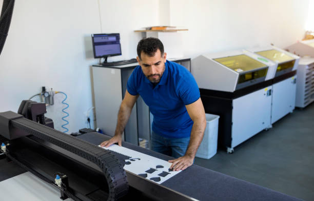 istock Hispanic mature man working in printing office 1137036663