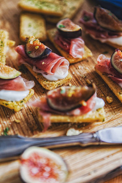 istock Honey roasted figs with goat cheese and Serrano ham on toast 1137037096