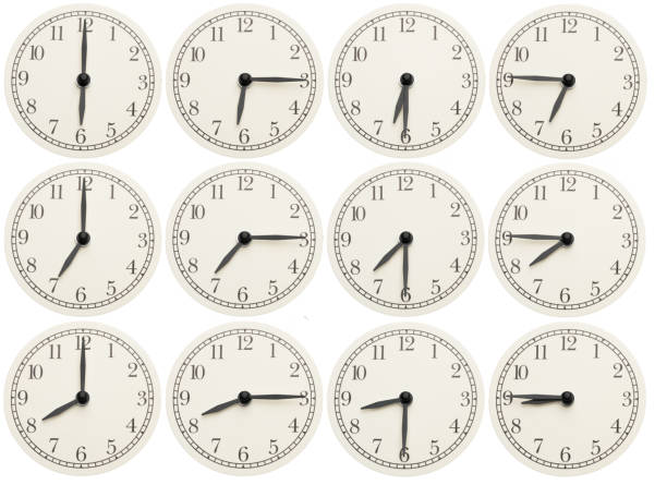 Set of office clocks showing various time isolated on white background