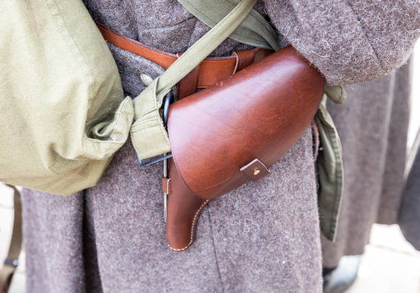 istock Vintage leather holster and other ammunition on the belt 1137040237