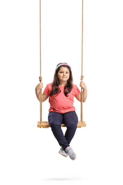 istock Little girl sitting on a swing 1137040263