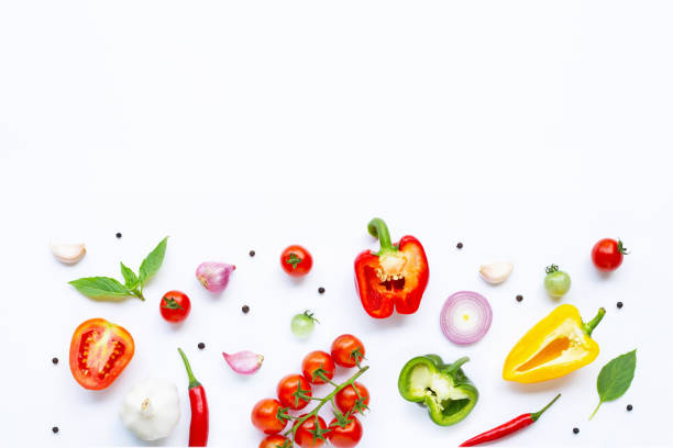 istock Various fresh vegetables and herbs on white. Healthy eating concept 1137040822