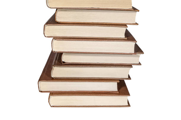 istock Stack of brown books isolated on white background 1137041579
