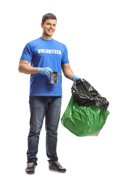 istock Male volunteer holding a bag and a tin can 1137042222