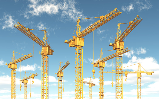 Computer generated 3D illustration with construction cranes against a blue sky with clouds