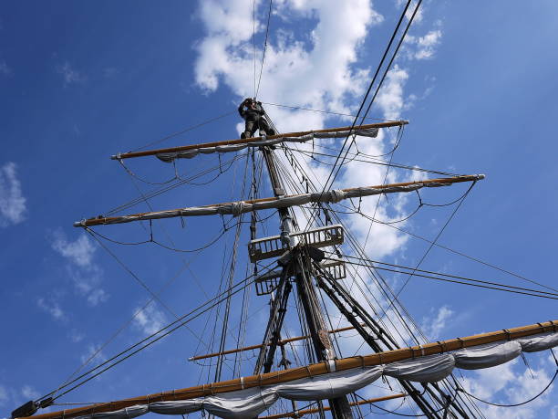istock Wooden sailing ship is on the sea 1137043455
