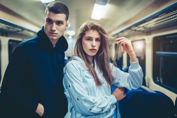 istock Young couple in a train vehicle 1137043957