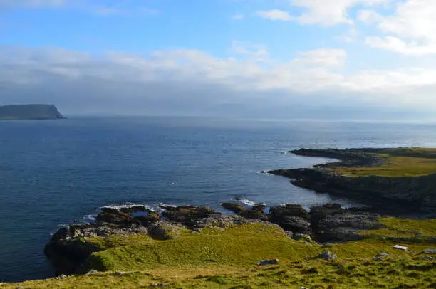 Beautiful rugged rocky coastline on Neist Point in Scotland.