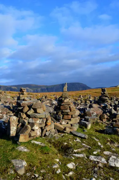 Stacks of wishing rocks on the Isle of Skye in Scotland.
