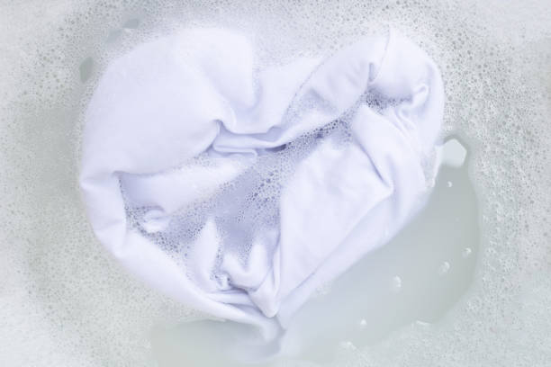 istock Soak a cloth before washing, white cloth 1137044334