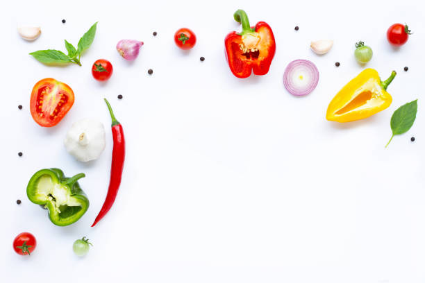 istock Various fresh vegetables and herbs on white. Healthy eating concept 1137045028