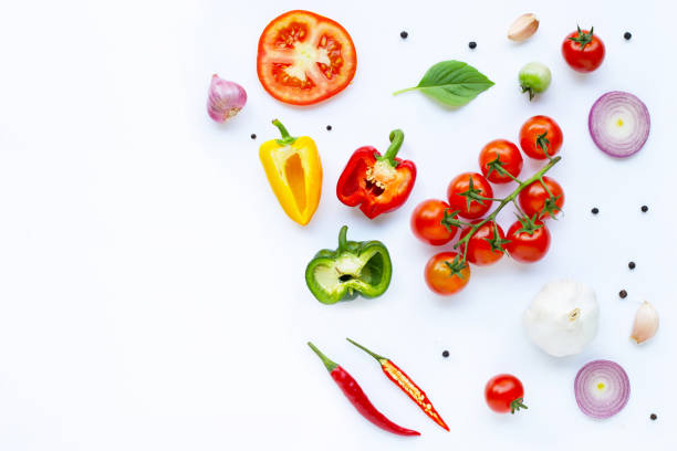 istock Various fresh vegetables and herbs on white. Healthy eating concept 1137045049