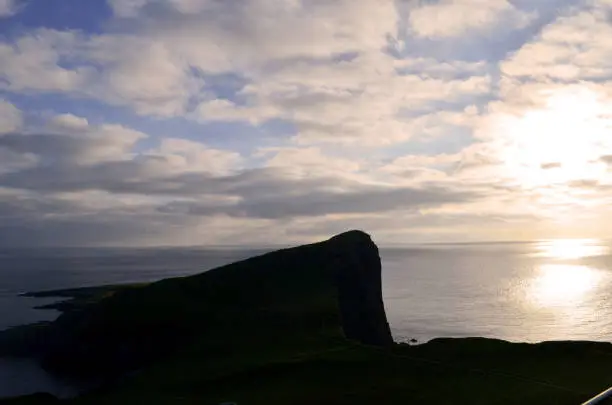 Beautiful silhouetted Neist Point on the Isle of Skye in Scotland.