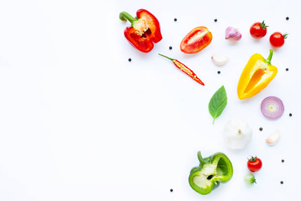 istock Various fresh vegetables and herbs on white. Healthy eating concept 1137045107