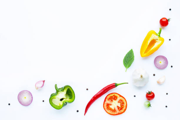 istock Various fresh vegetables and herbs on white. Healthy eating concept 1137045133