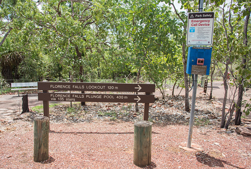 Litchfield, Northern Territory, Australia-December 24,2017: Trail sign and emergency phone in Litchfield National Park in tropical Litchfield, Australia