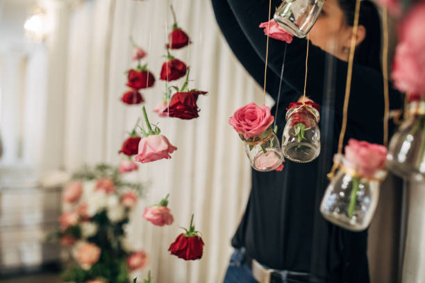 istock Woman arranging flowers for wedding 1137047202