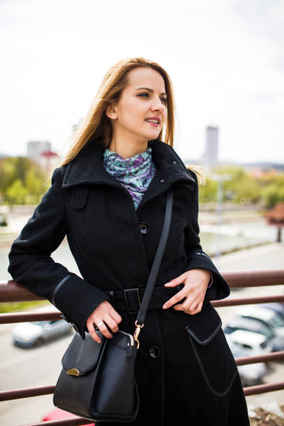 istock A young woman with a mobile phone 1137048399