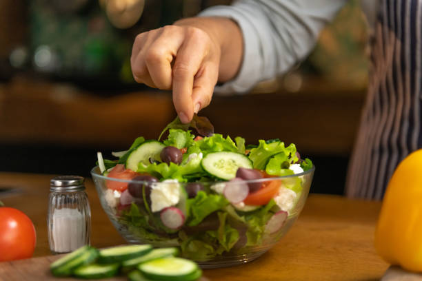 istock Seasoning the salad 1137049965