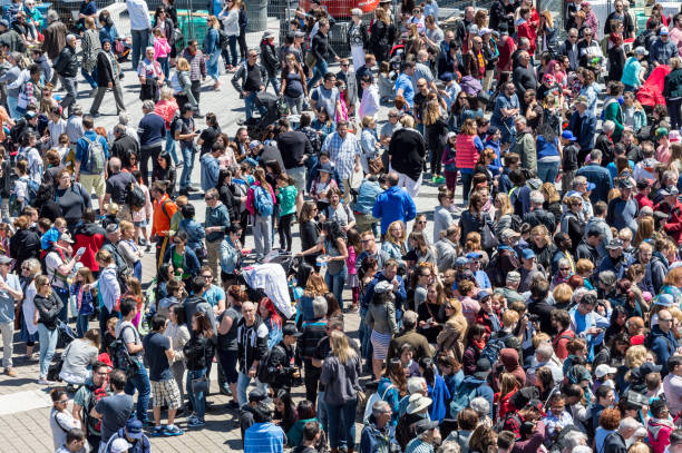 Montreal, CA - 20 May 2017: Crowd on Place des Arts attending Royal de Luxe street performance