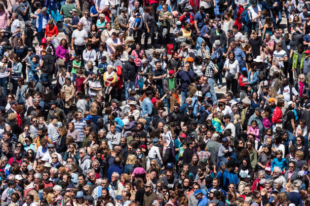 Crowd of people on the street. No recognizable faces