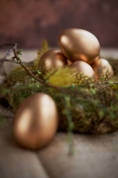 istock Arrangement for Easter with golden eggs, still life 1137057095