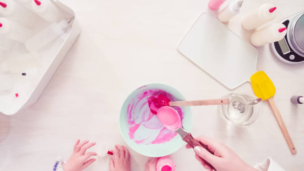 istock Mixing royal icing to decorate sugar cookies. 1137059956