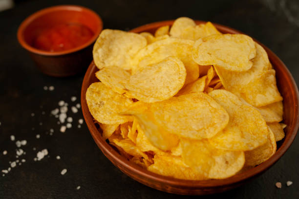 istock Chips and sauce. on the background concrete, asphalt 1137060364
