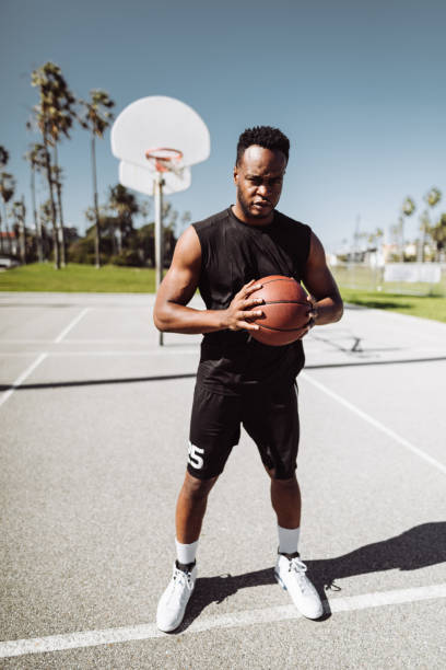 istock serious basketball player portrait 1137066588