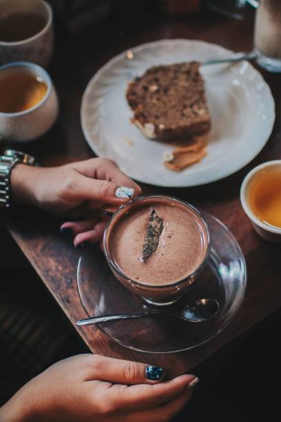istock Hot coffee holding with two hand in coffee shop 1137067350