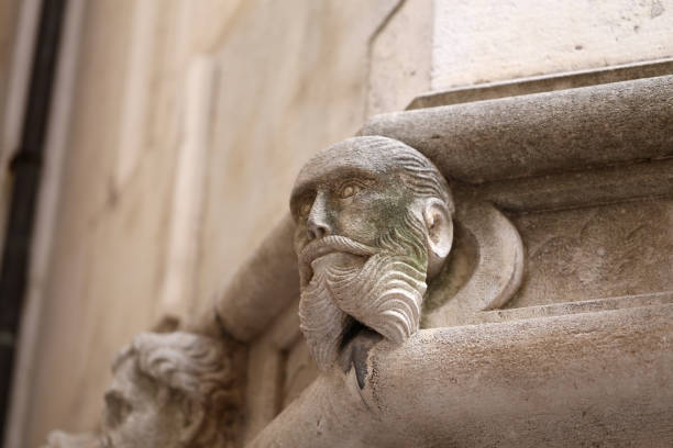 istock Famous faces on the side protal of Sibenik cathedral. 1137068127