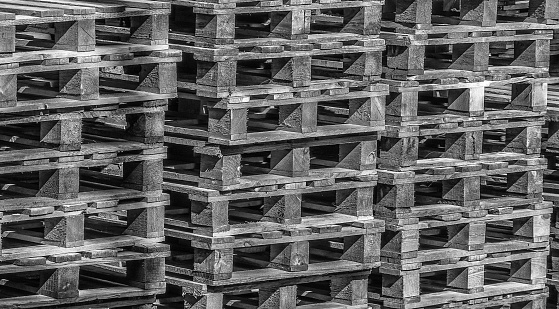 Abstract pick-up of stacked wooden pallets, Black and white, bw
