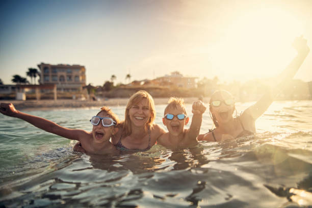 istock Family having fun in summer sea 1137069464