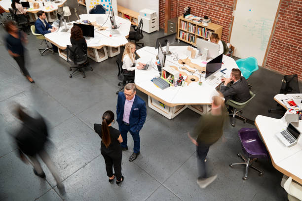 istock Overhead View Of Busy Modern Open Plan Office 1137071231
