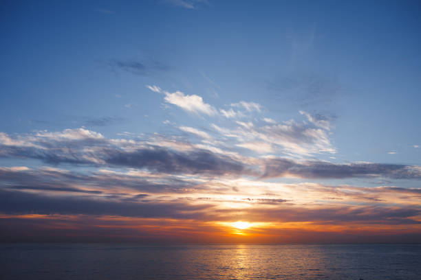 istock sunrise at ocean seascape with reflection 1137072792