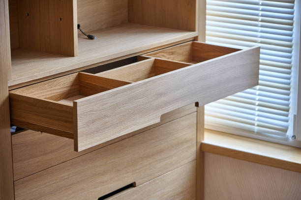 istock Wooden cupboard with opened drawer. Modern furniture 1137082155