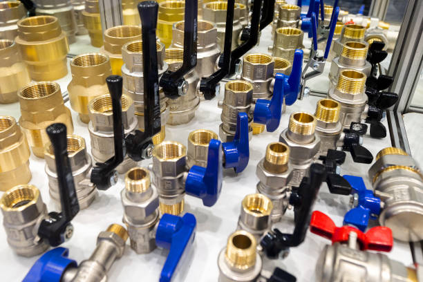 a variety of plumbing pipe connectors, corners, fittings, nipples. - valve imagens e fotografias de stock