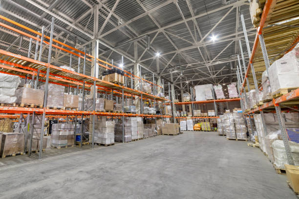 istock Long shelves with a variety of boxes and containers. 1137082477