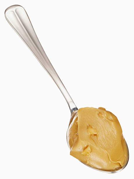 peanut butter Spoon of Peanut Butter stock pictures, royalty-free photos & images
