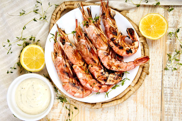 istock Grilled big tiger shrimps prawns on white plate 1137085836