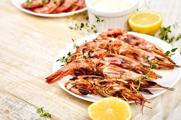 istock Grilled big tiger shrimps prawns on white plate 1137085860