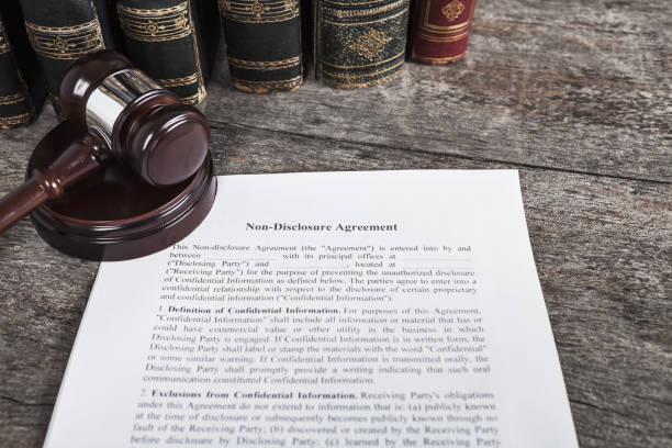 istock Non-Disclosure Agreement with Law Books and Gavel 1137088767