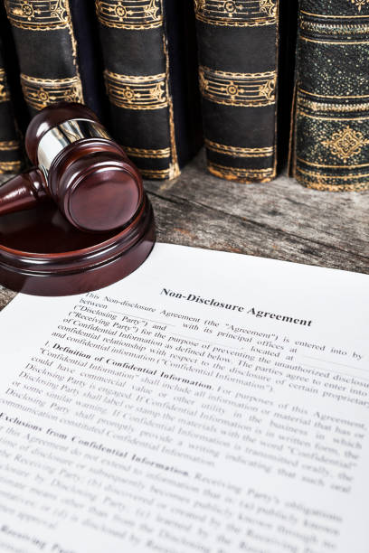 istock Non-Disclosure Agreement with Law Books and Gavel 1137088769