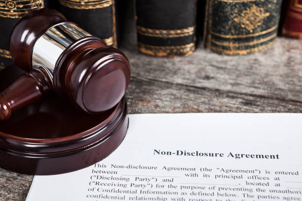 istock Non-Disclosure Agreement with Law Books and Gavel 1137088810
