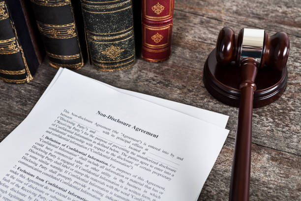 istock Non-Disclosure Agreement with Law Books and Gavel 1137088817