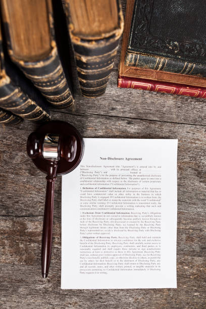 istock Non-Disclosure Agreement with Law Books and Gavel 1137088931