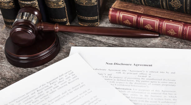 istock Non-Disclosure Agreement with Law Books and Gavel 1137088951