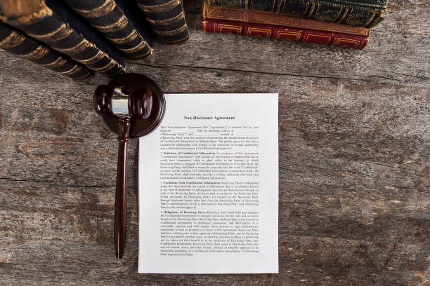 istock Non-Disclosure Agreement with Law Books and Gavel 1137089228