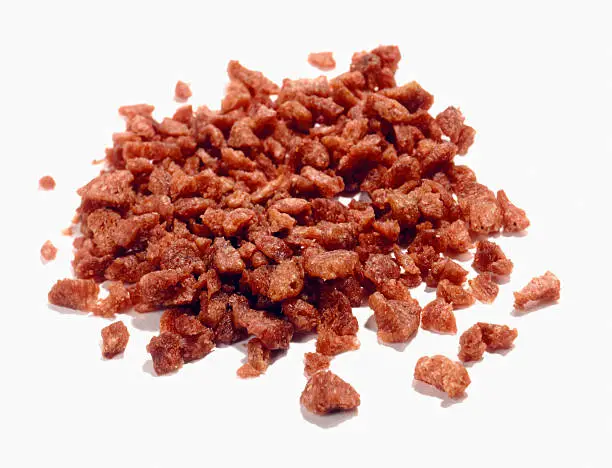 Photo of bacon bits cut out on white