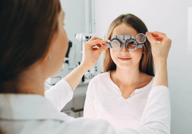 istock girl having her eyes checked at ophthalmologist 1137094623